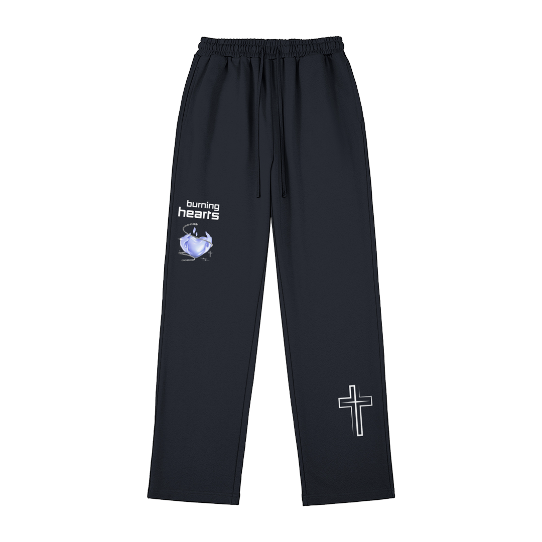 HYPE4HOLY CHRISTIAN APPAREL STREETWEAR RELAXED FIT SWEATPANTS BURNING HEARTS DESIGN FRONT DARK NAVY | pants with 'burning hearts' logo and cross design on a white background